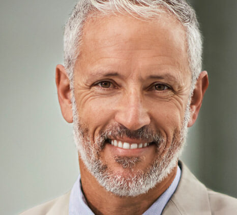 Close-up of clear ceramic braces on teeth