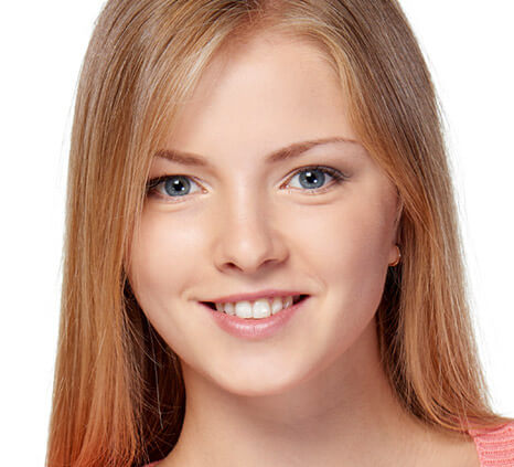 Child patient smiling after orthodontic treatment
